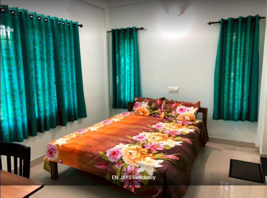 En Jays Residency Appartement Kottayam Buitenkant foto